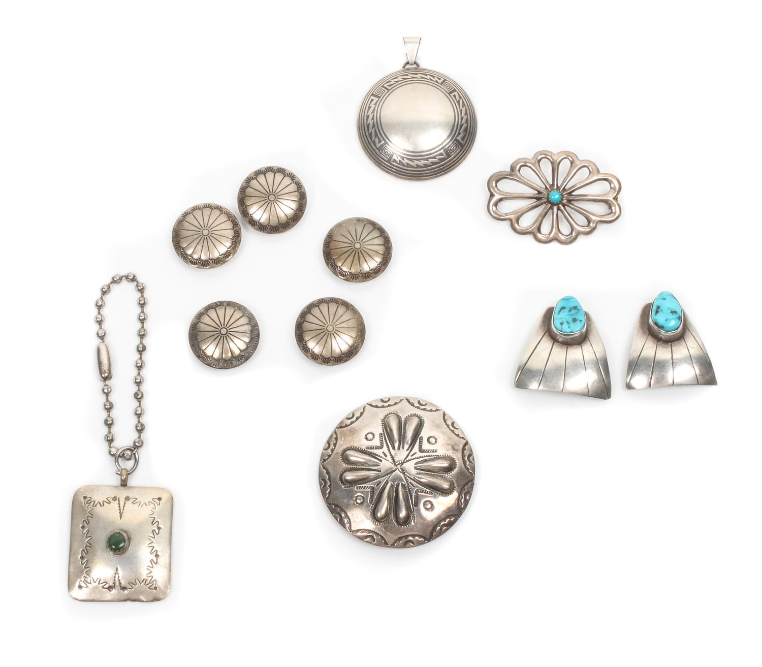 Nine Southwestern Jewelry Items Diameter of largest pin 1 3/4 inches.