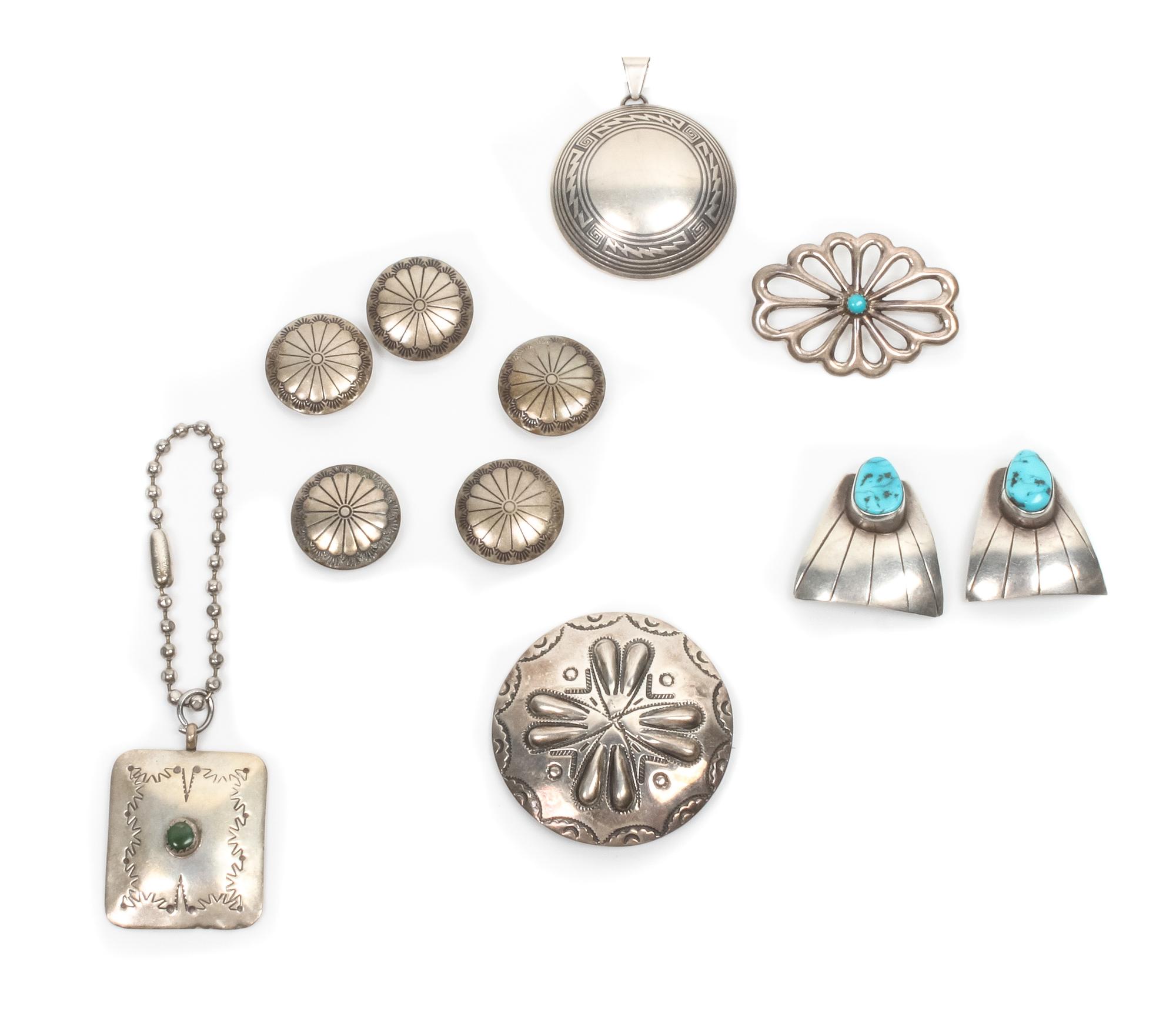 Nine Southwestern Jewelry Items Diameter of largest pin 1 3/4 inches.