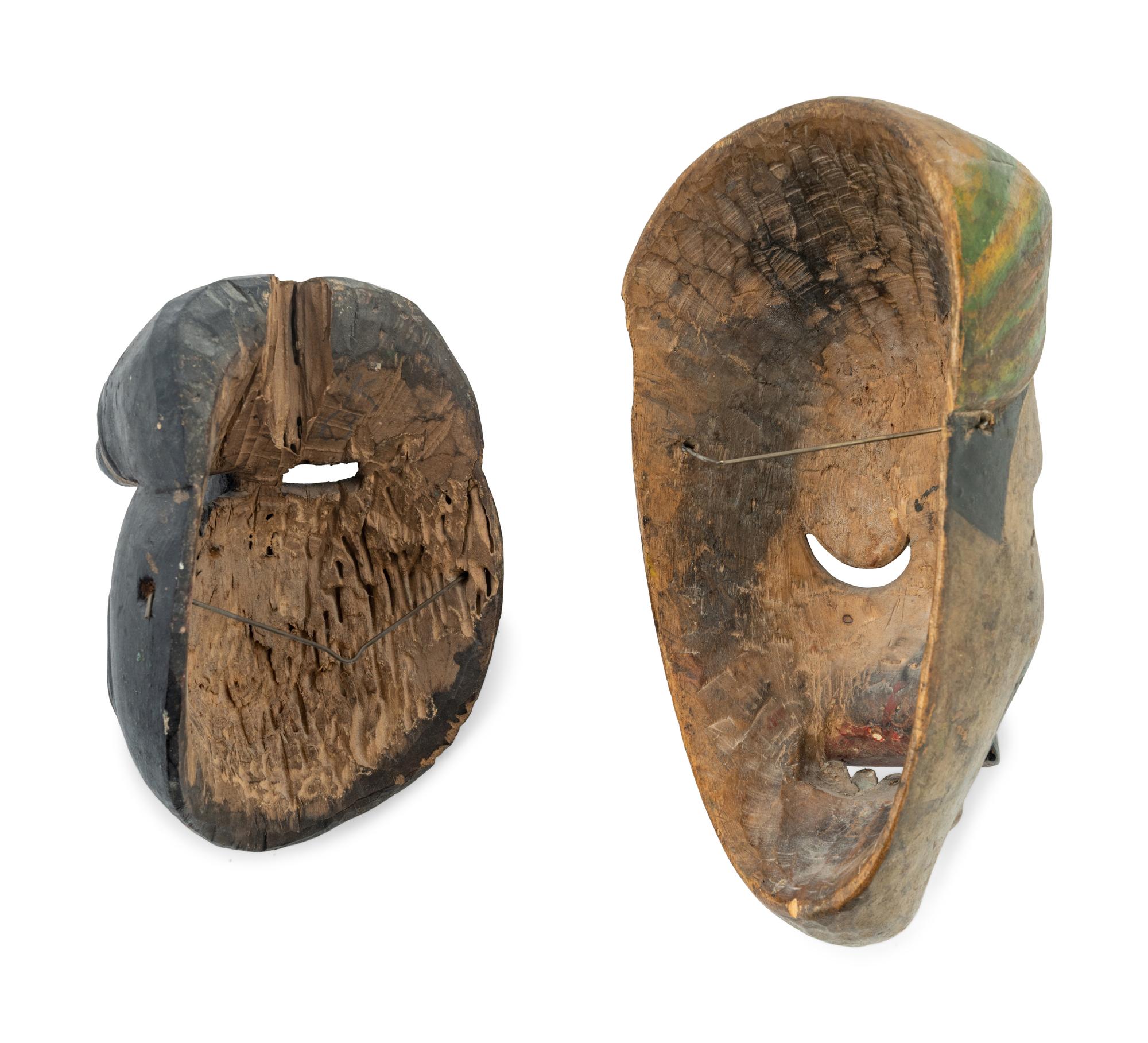 Two Mexican Carved and Polychromed Wood Masks