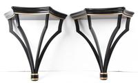 A Pair of Regency Style Black and Gilt Wall Brackets Height 17 inches.