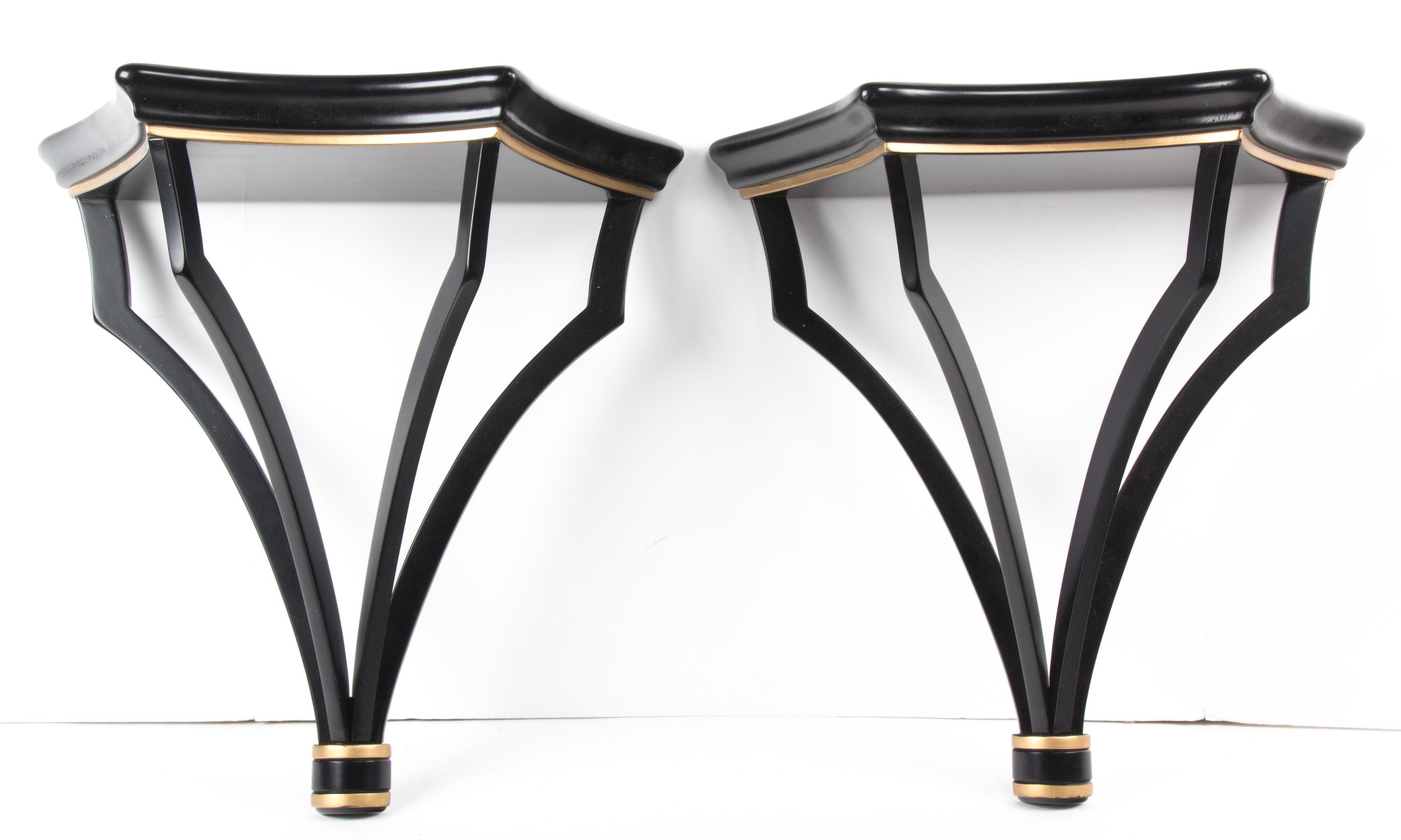 A Pair of Regency Style Black and Gilt Wall Brackets Height 17 inches.