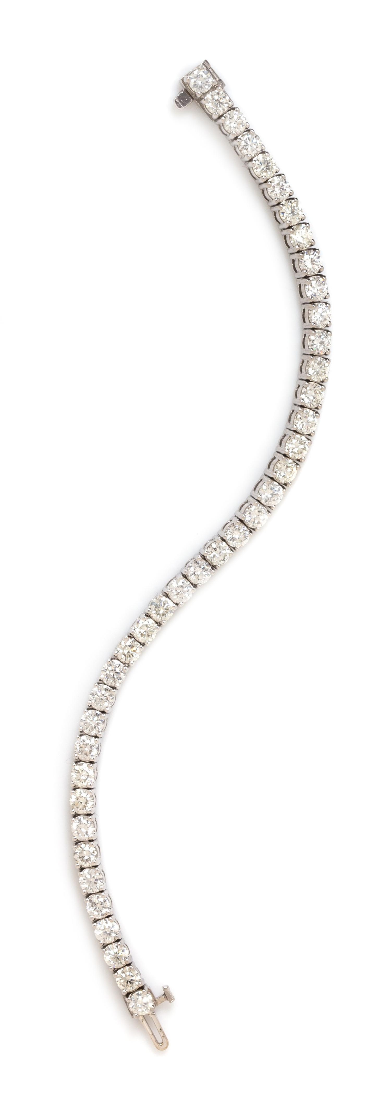 An 18 Karat White Gold and Diamond Line Bracelet, 12.00 dwts.