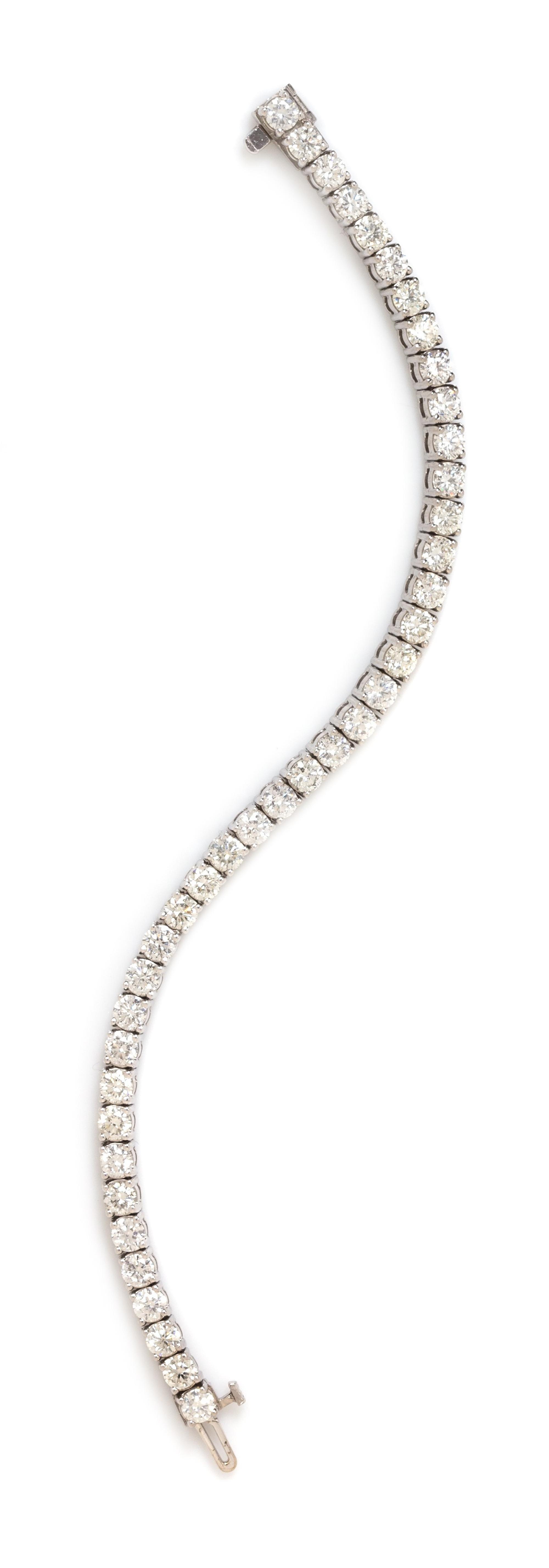 An 18 Karat White Gold and Diamond Line Bracelet, 12.00 dwts.