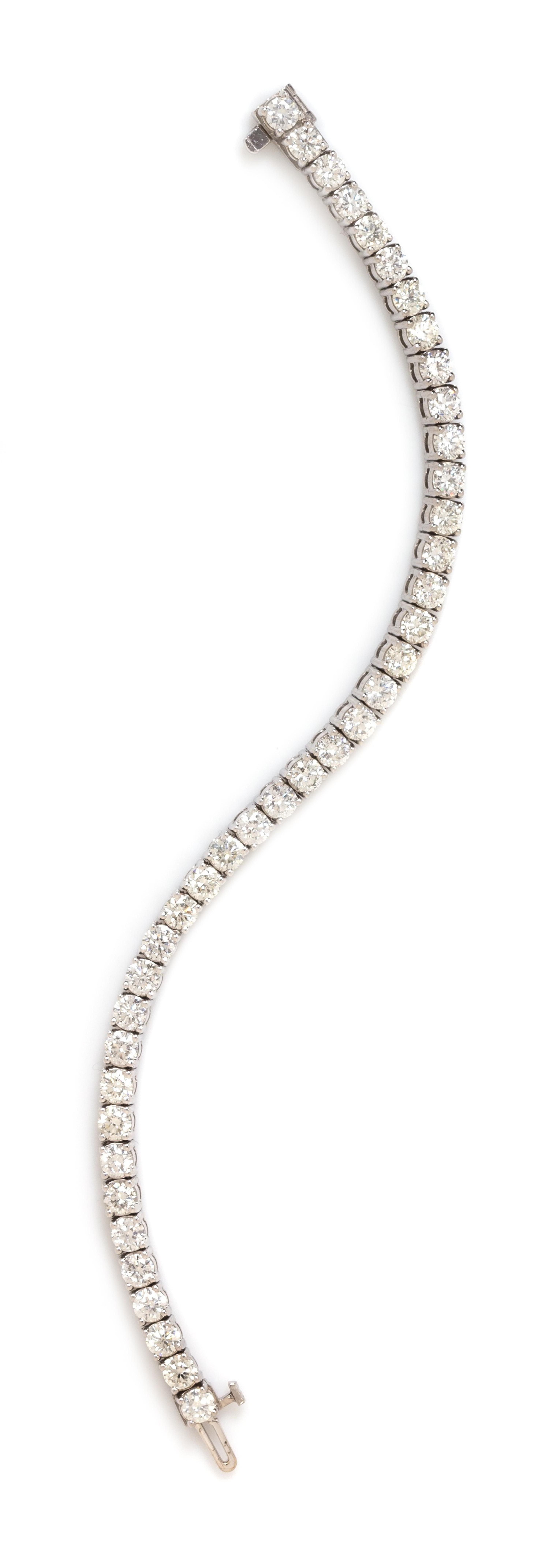 An 18 Karat White Gold and Diamond Line Bracelet, 12.00 dwts.