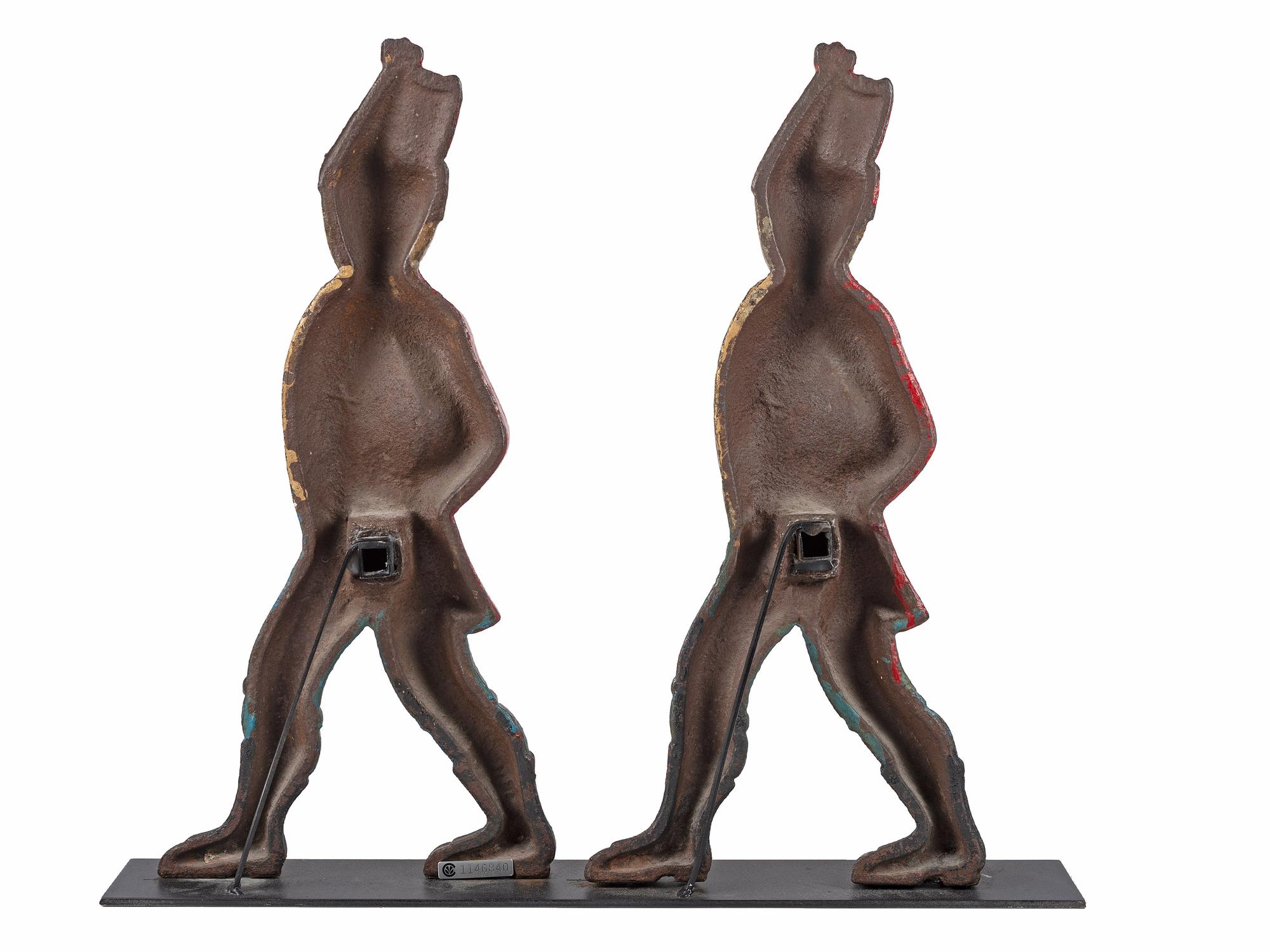 A Pair of Paint Decorated Cast-Iron Hessian Soldier Andiron Supports