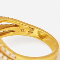 An 18K Yellow Gold, Aquamarine, and Diamond Ring