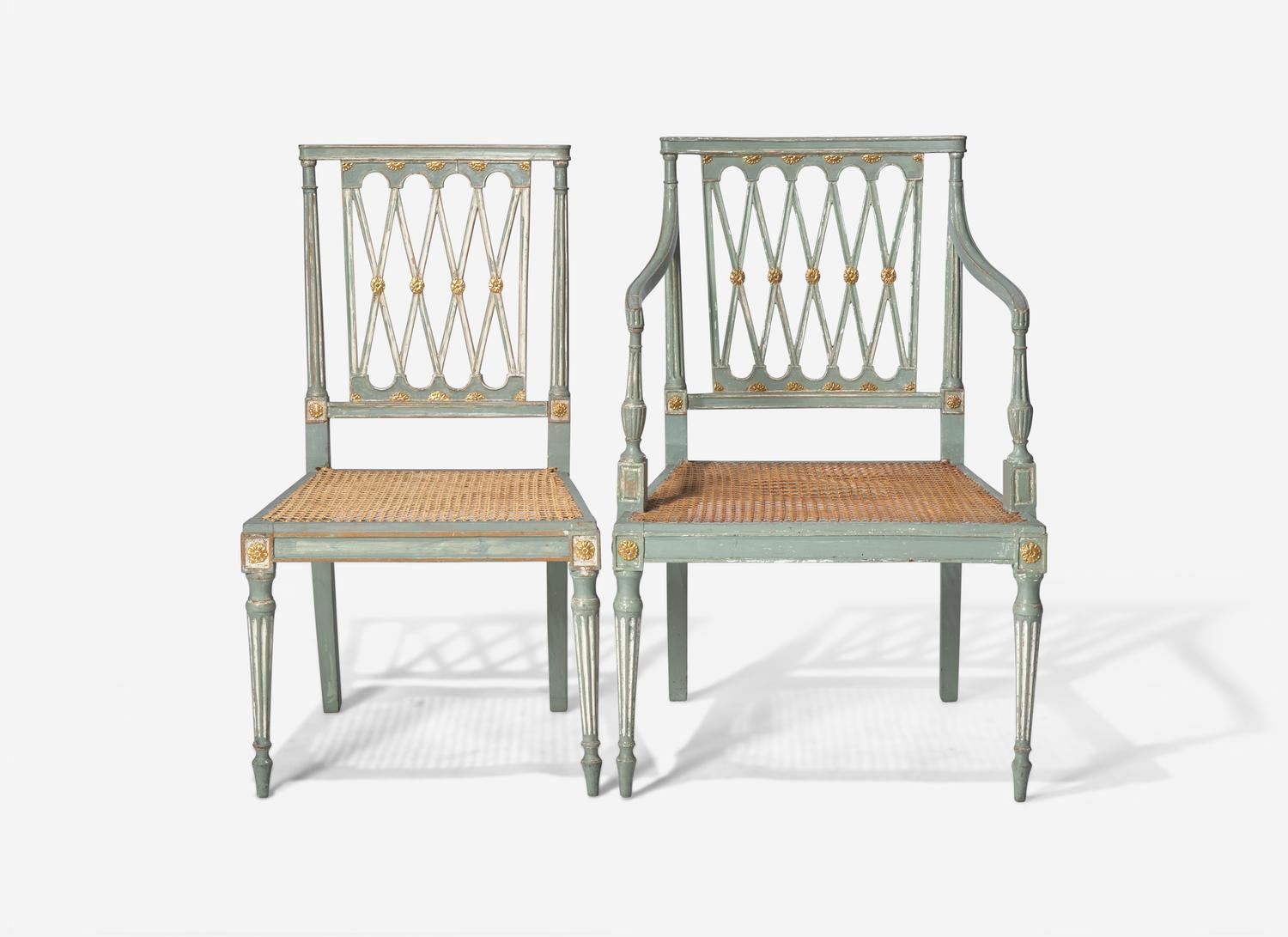 A Set of Ten George III Green and White Painted and Parcel Gilt Lattice Back Dining Chairs
