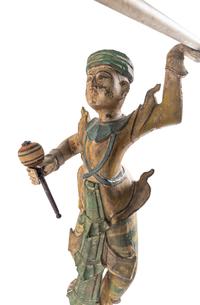 A Pair of Southeast Asian Carved and Polychrome Decorated Figures with a Gong