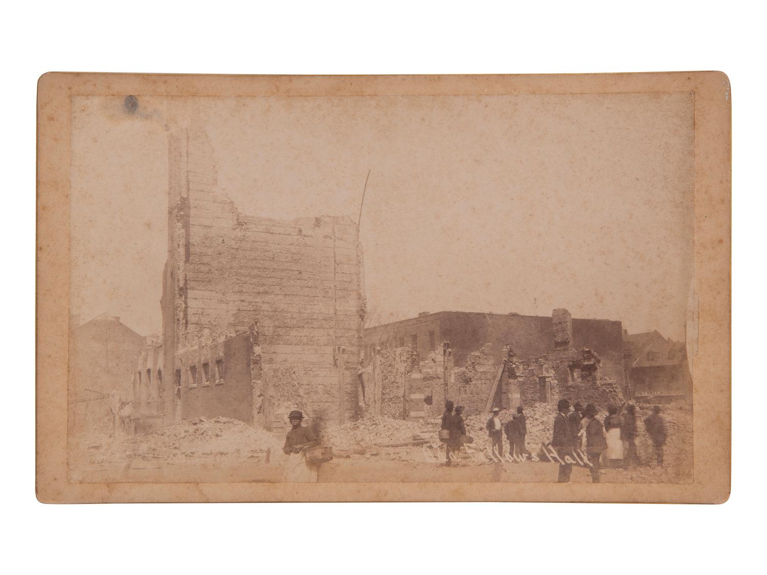 [EARLY PHOTOGRAPHY]. 7 photographs documenting the Savannah Fire of 1889 by J.N. Wilson.