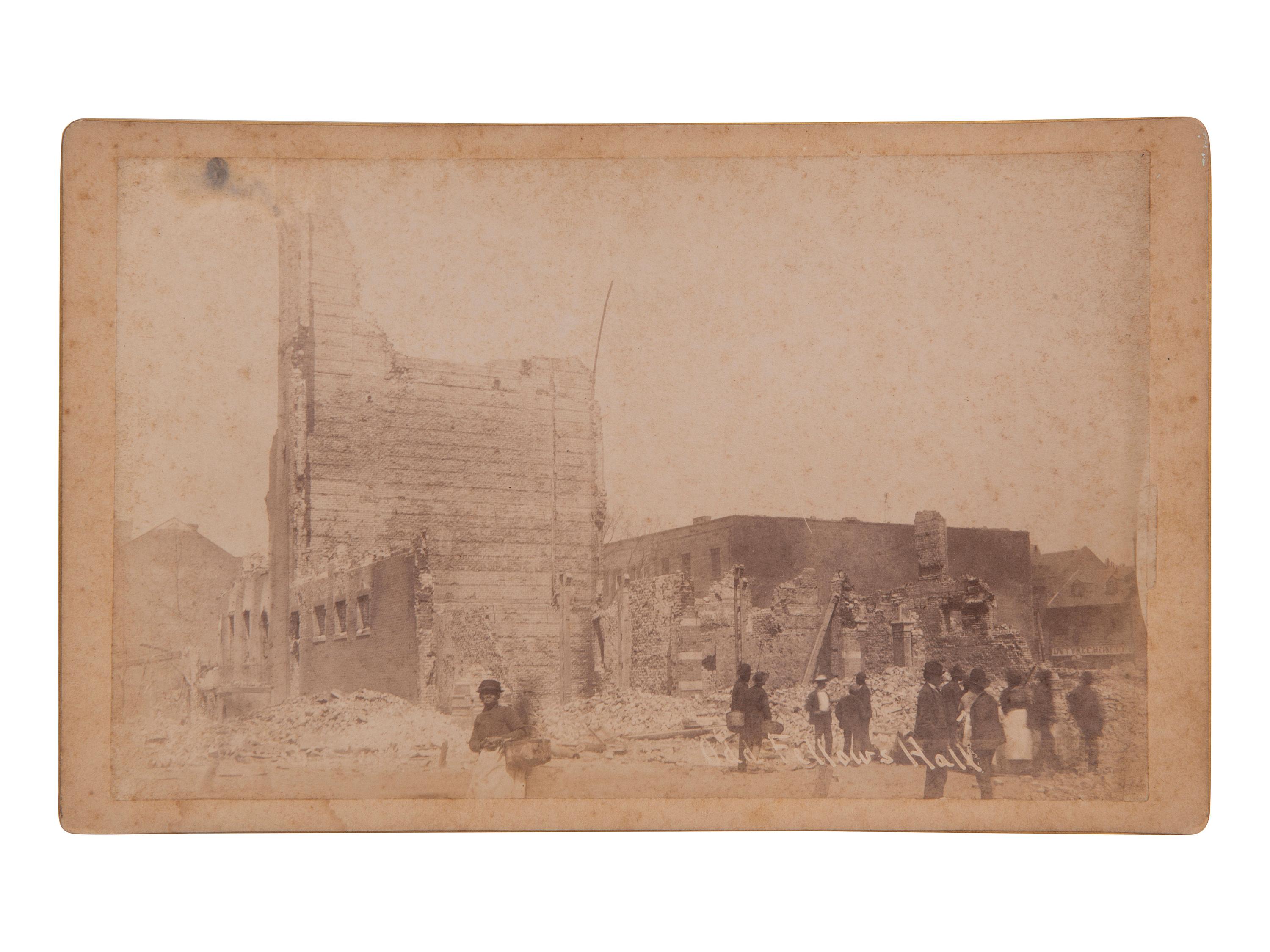 [EARLY PHOTOGRAPHY]. 7 photographs documenting the Savannah Fire of 1889 by J.N. Wilson.