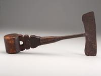 A Carved Wood and Iron Whaling Tool