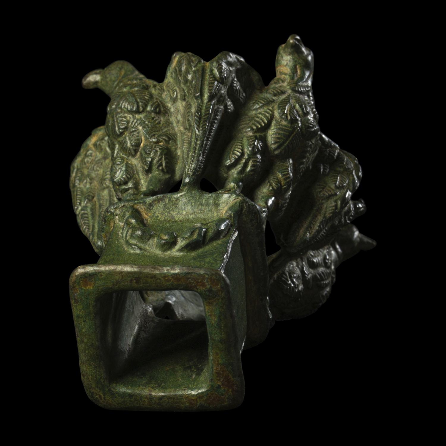 A Roman Bronze Lamp Stand with Four Eagles