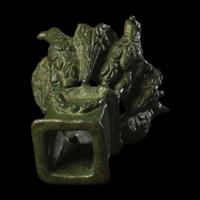 A Roman Bronze Lamp Stand with Four Eagles