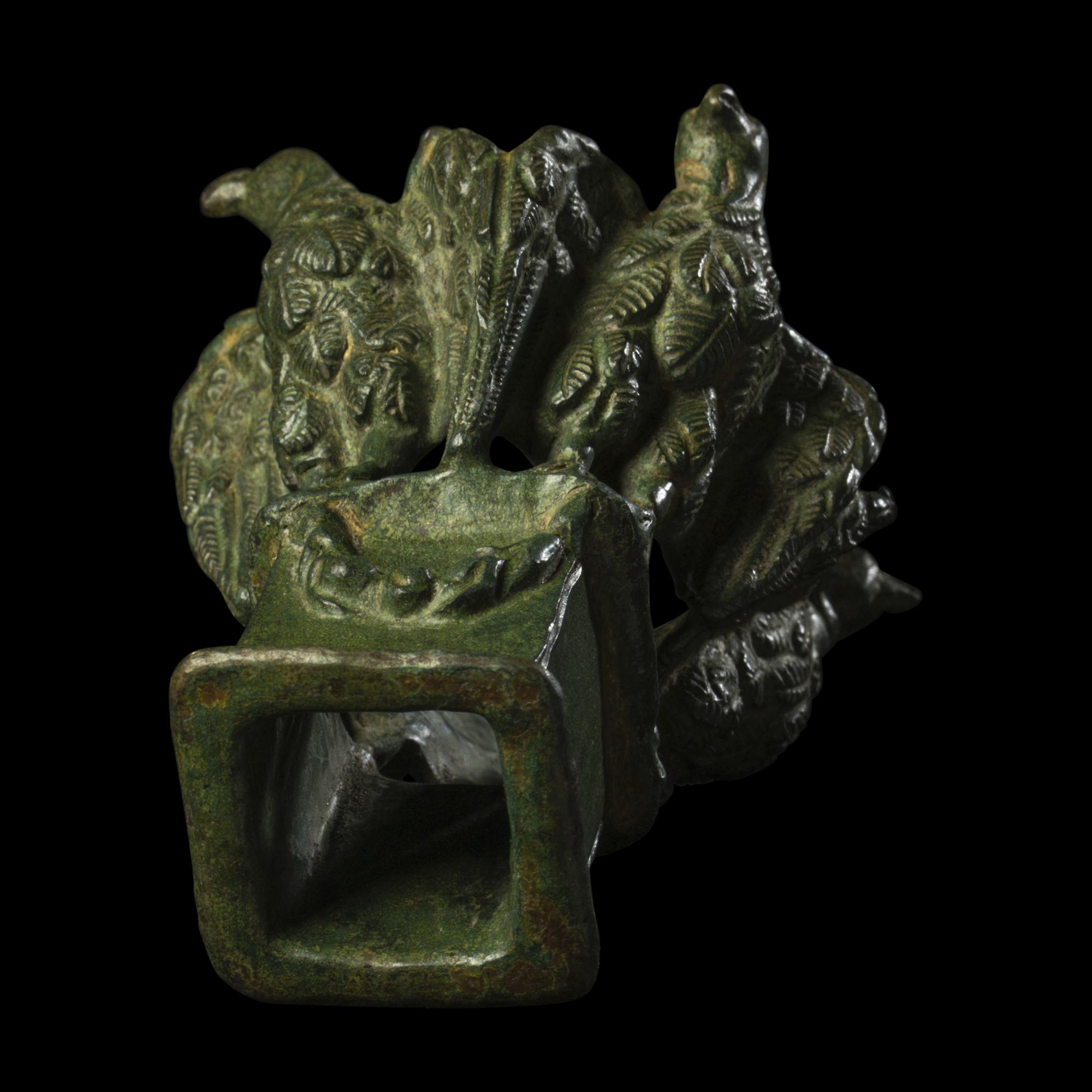 A Roman Bronze Lamp Stand with Four Eagles