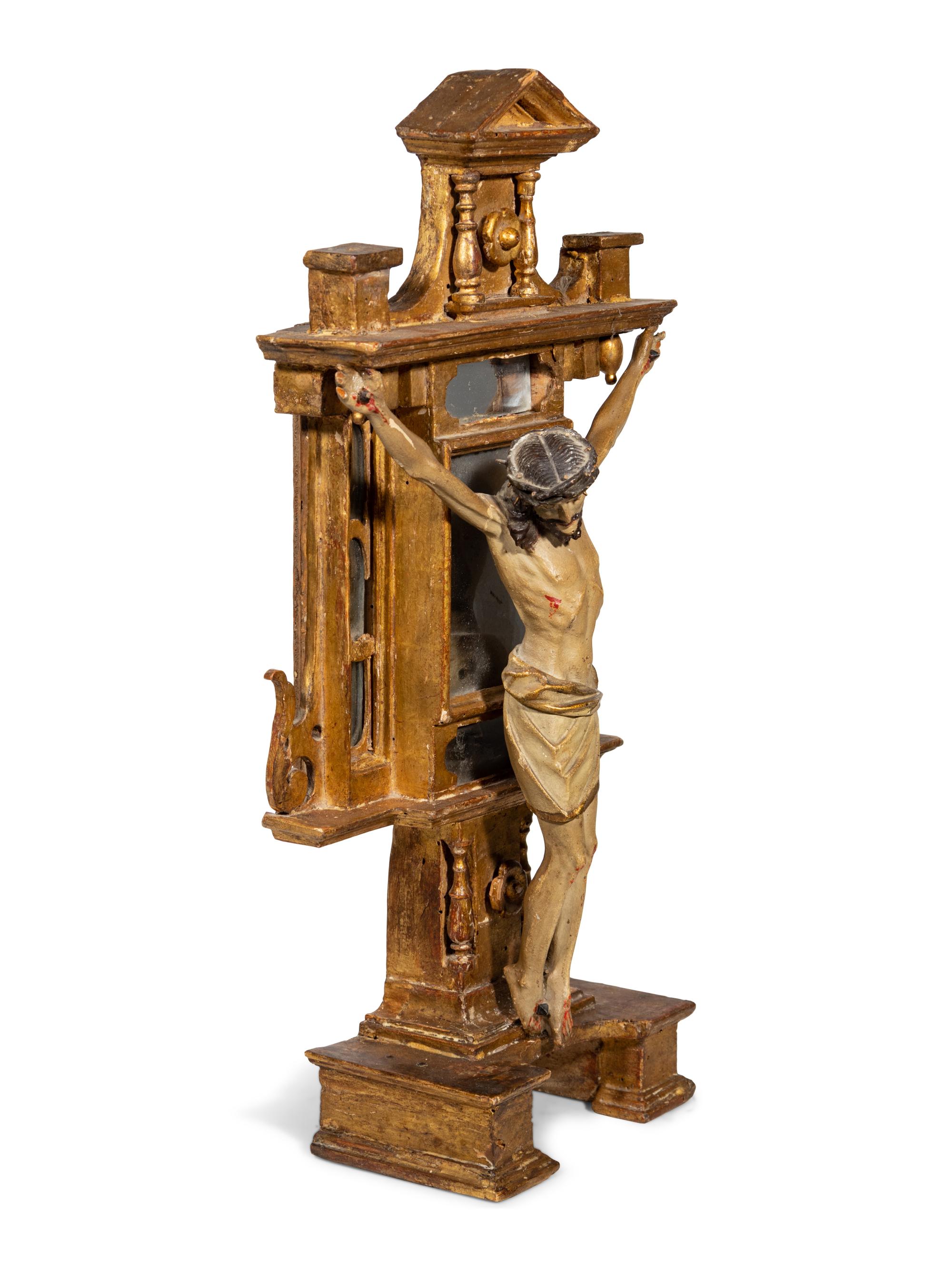 A Continental Carved, Polychromed, Parcel Gilt and Mirrored Crucifix
