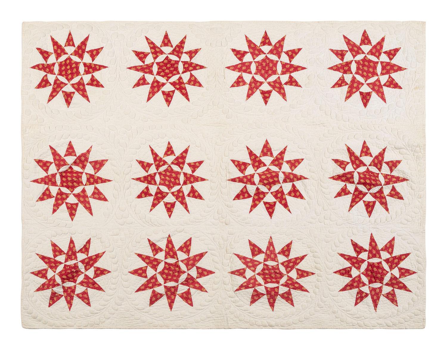 A Pieced and Trapunto Crib Quilt