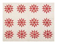 A Pieced and Trapunto Crib Quilt