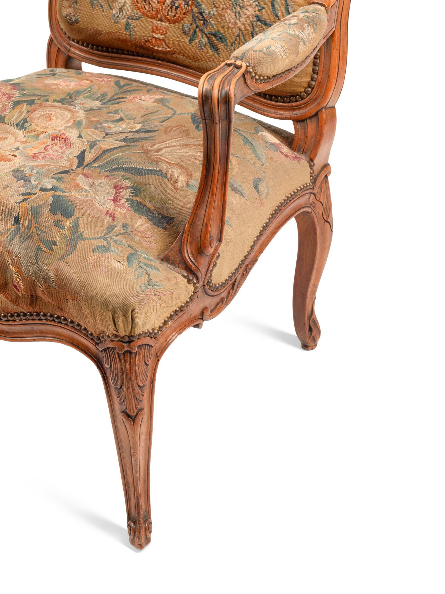 A Pair of Louis XV Style Beechwood Fauteuils