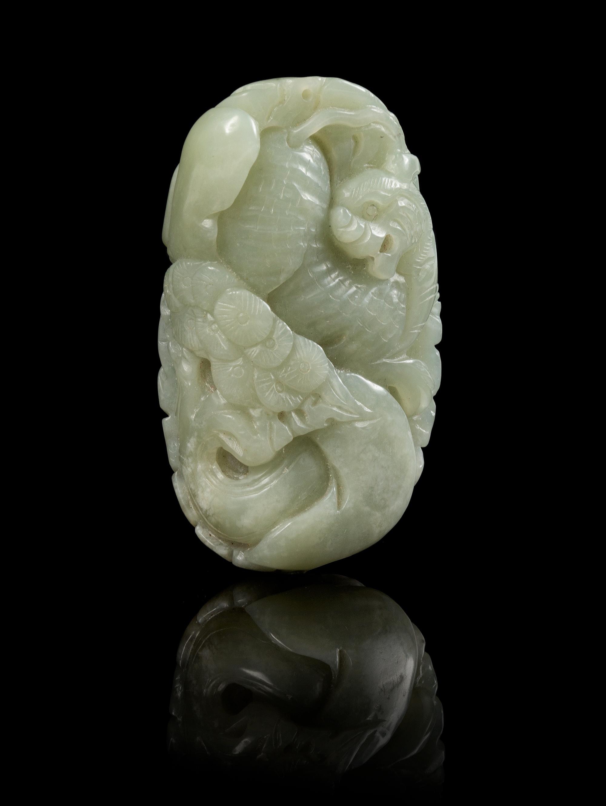 A Carved Jade Toggle Length 3 1/8 inches.