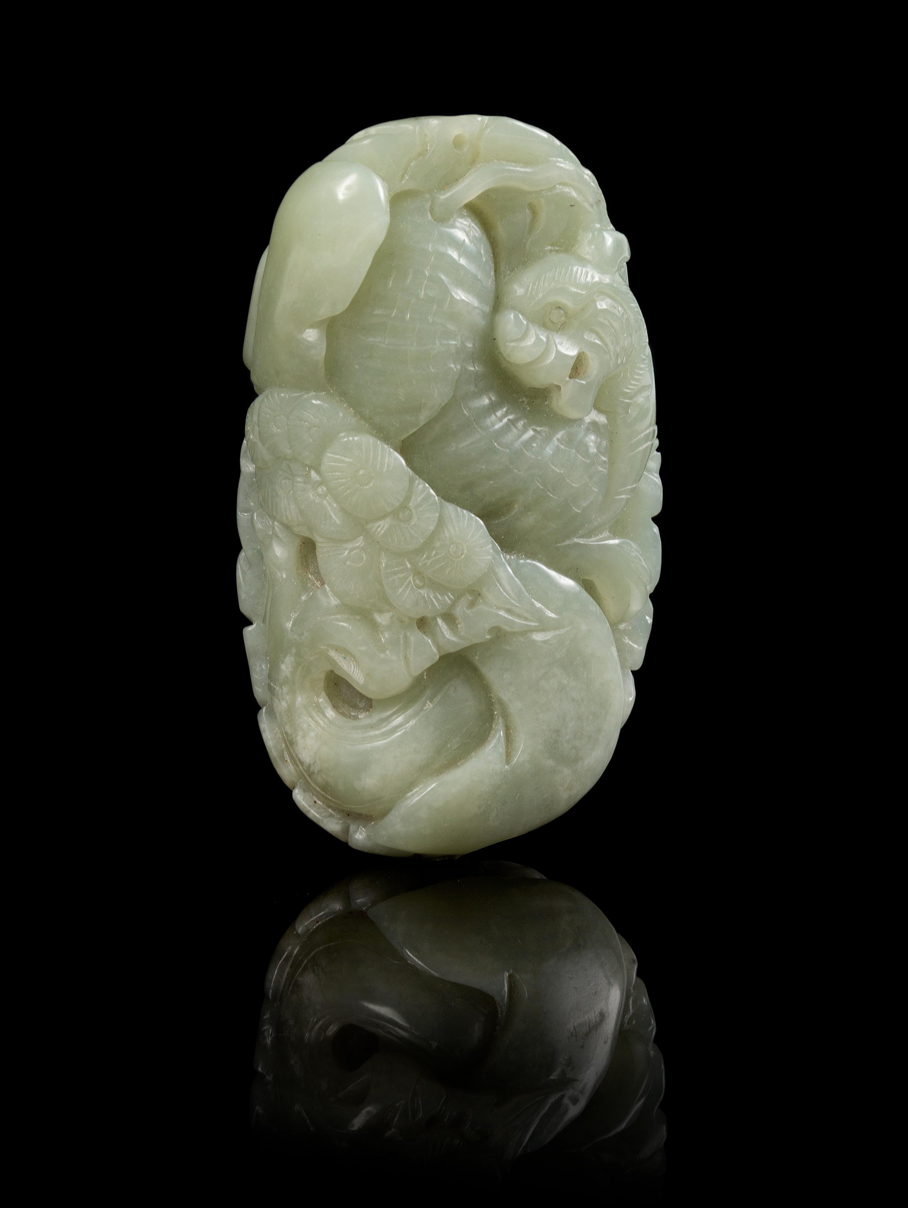 A Carved Jade Toggle Length 3 1/8 inches.