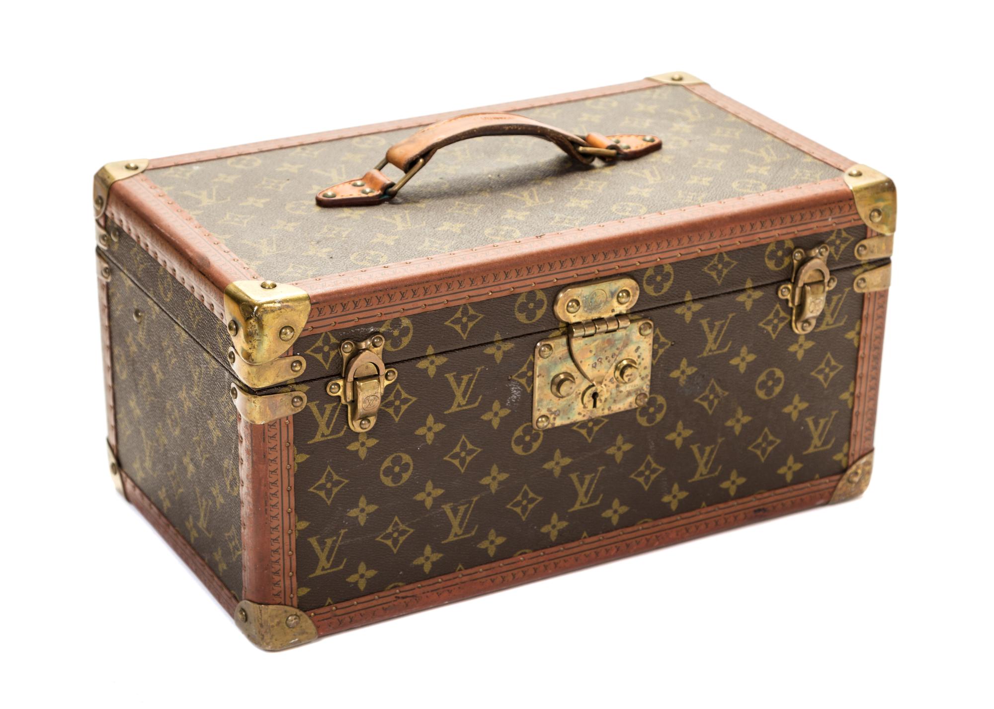 A Louis Vuitton Monogram Boite Bouteilles et Glace Beauty Train Case, 16" x 8" x 9".
