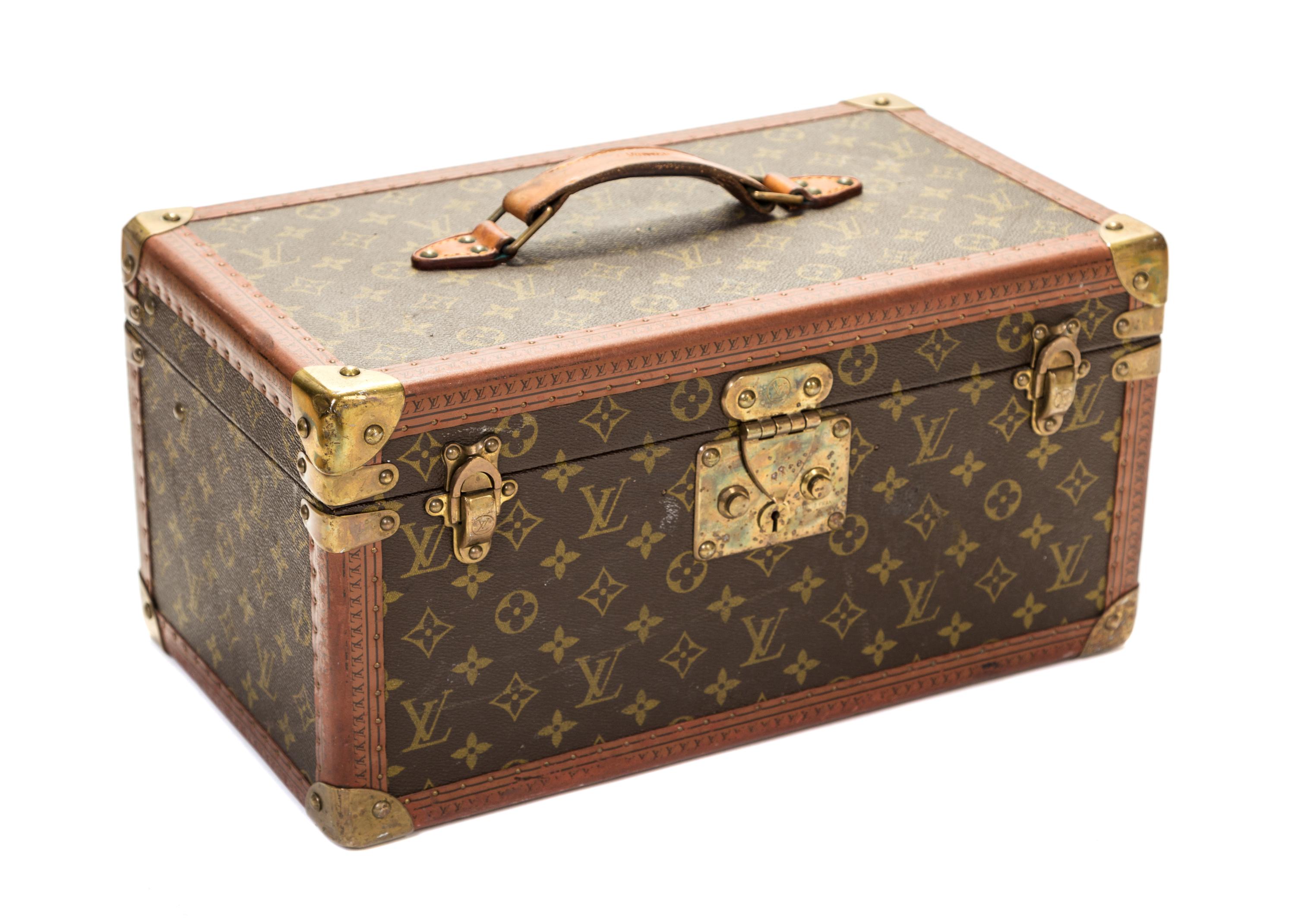 A Louis Vuitton Monogram Boite Bouteilles et Glace Beauty Train Case, 16" x 8" x 9".