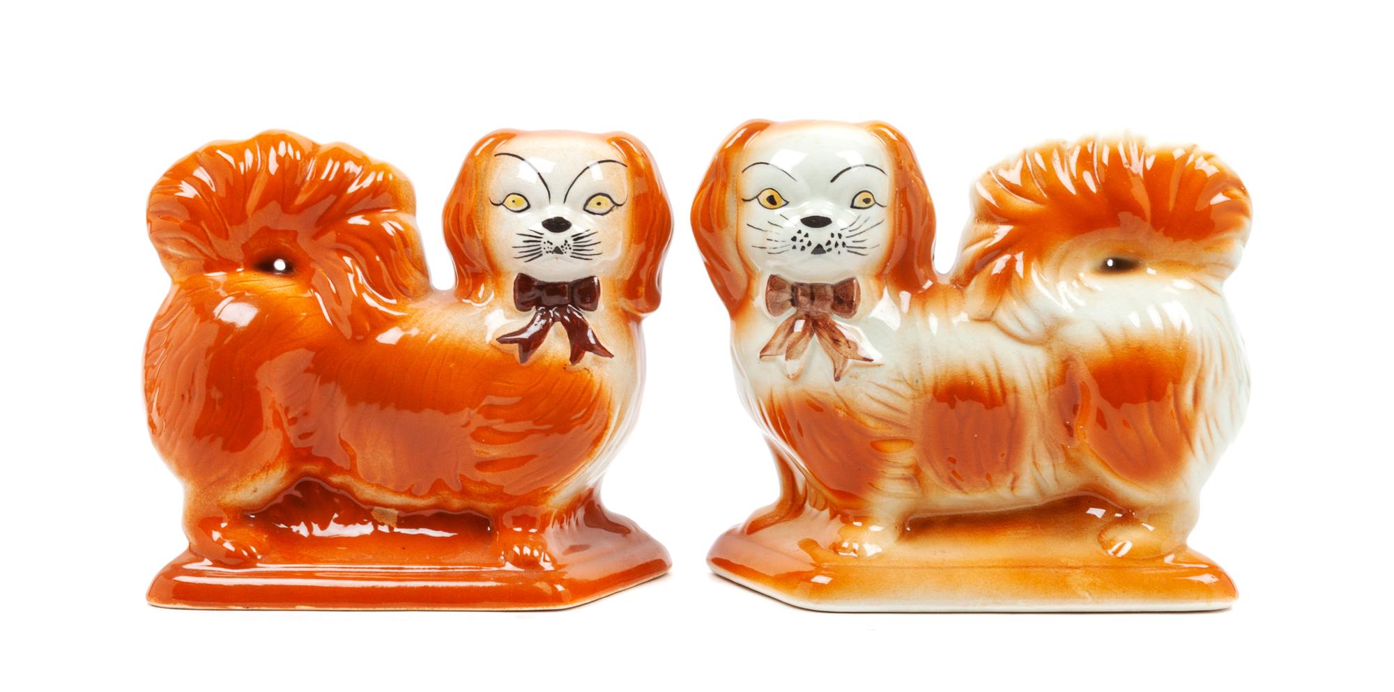 A Pair of Staffordshire Pekingese Figures Width 8 1/2 inches.