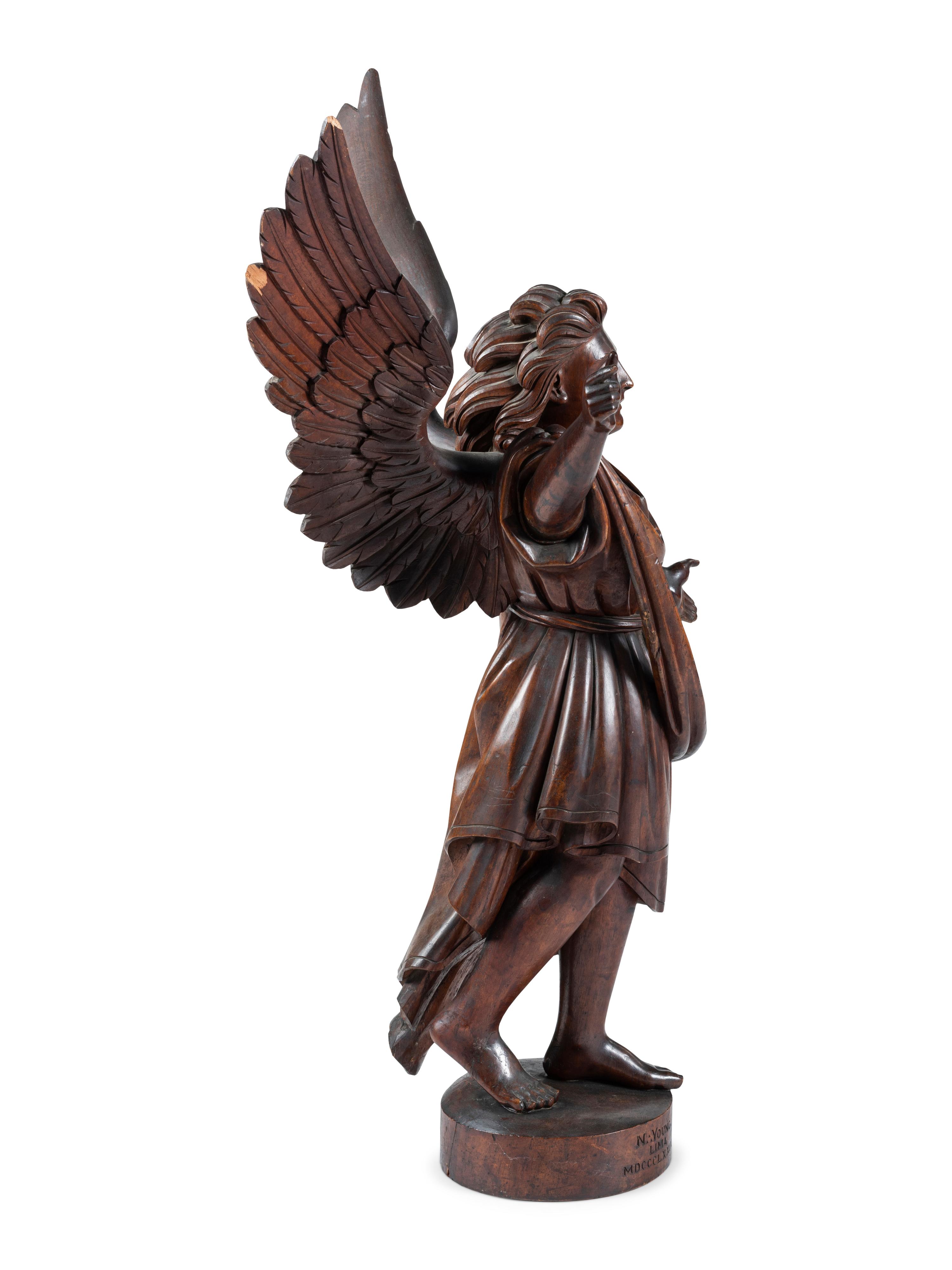 A Carved Walnut Figure of Angel Gabriel