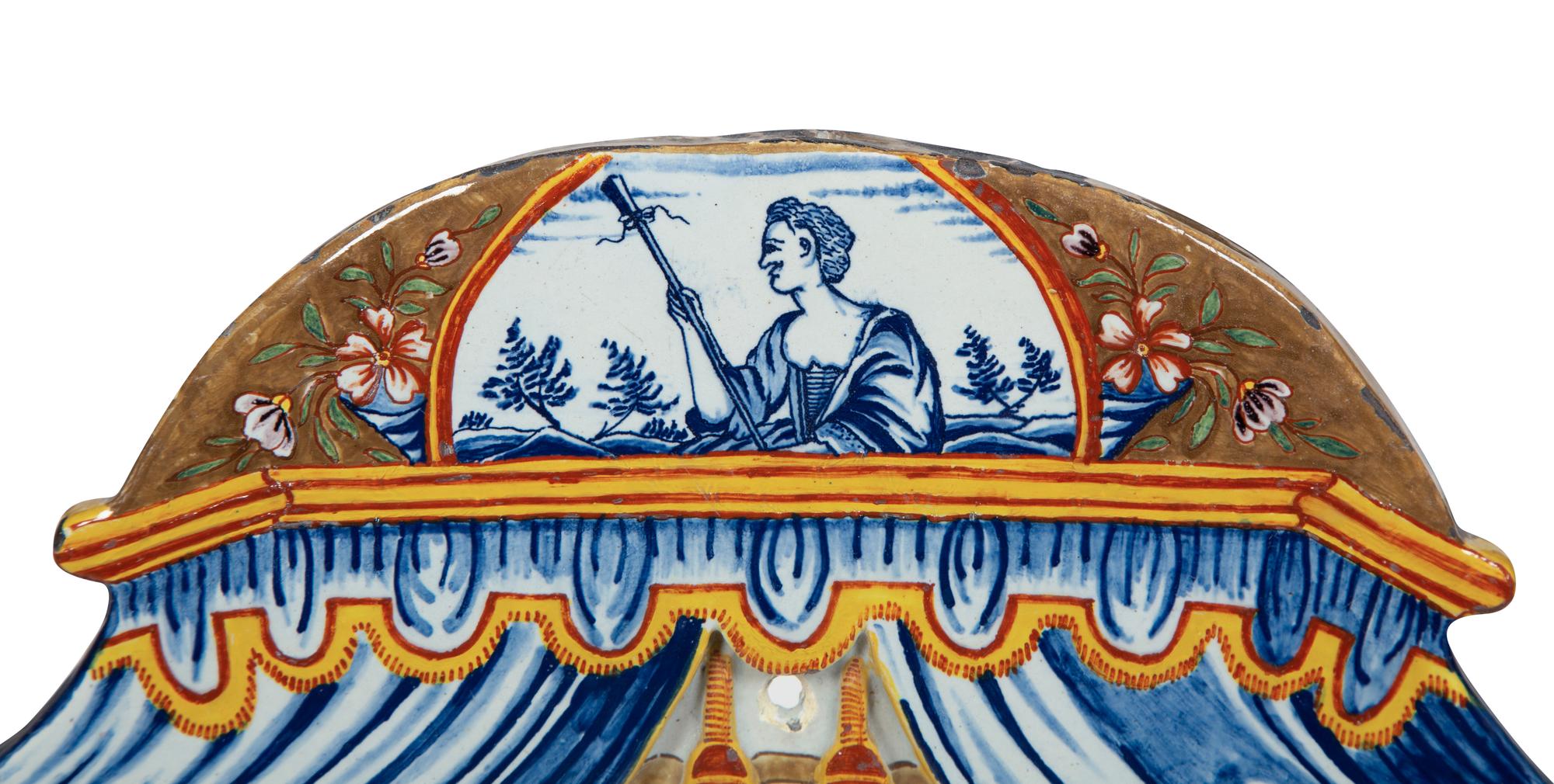 A Pair of Continental Polychrome Faience Wall Plaques