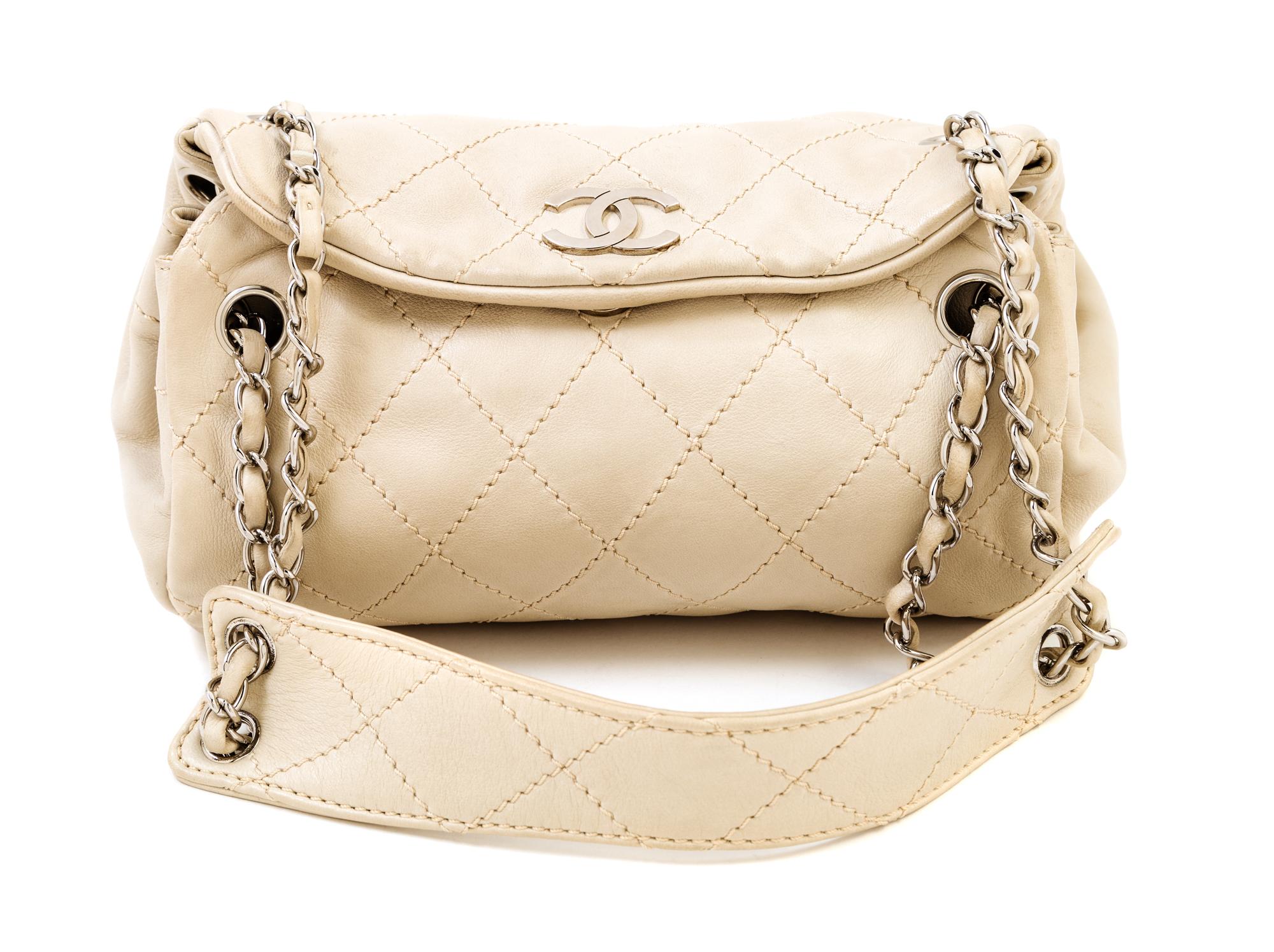 A Chanel Cream Lambskin Quilted Shoulder Bag, 9.5" x 7" x 5.5"; Strap drop: 10".