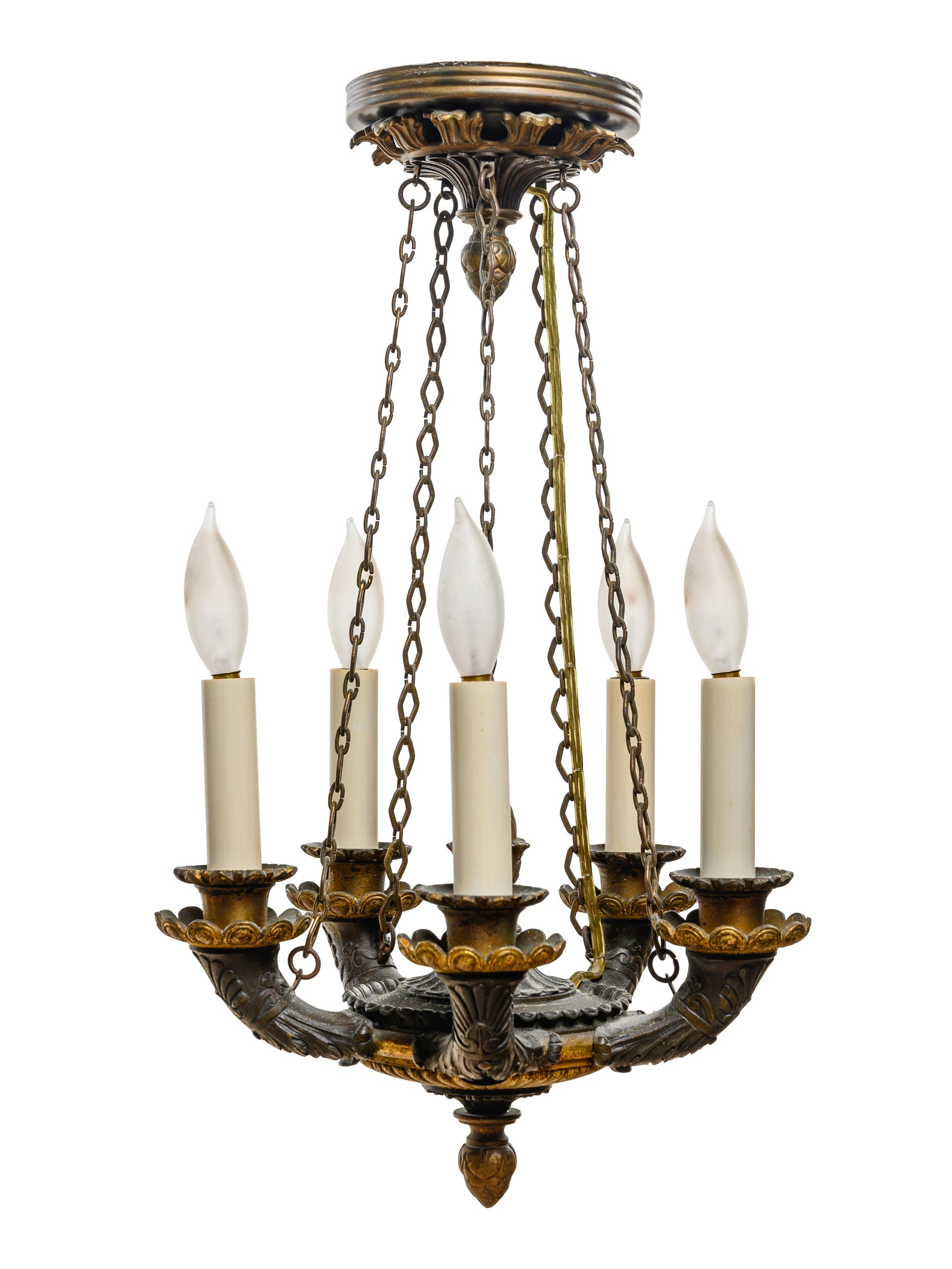 An Empire Style Gilt and Patinated Bronze Five-Light Chandelier