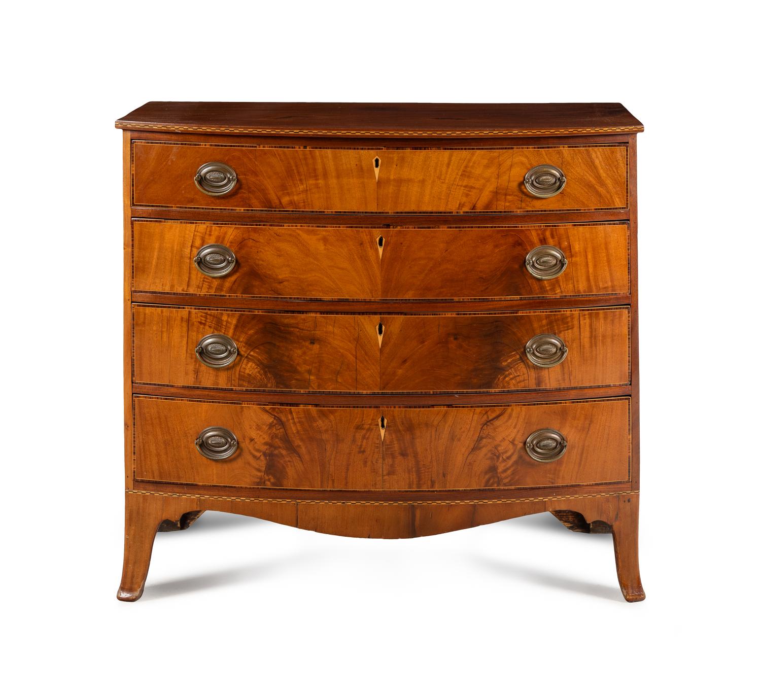 A Federal Inlaid and Figured Mahogany Bow-Front Chest of Drawers