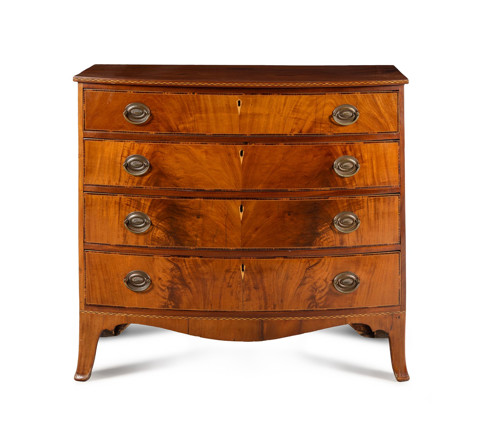 A Federal Inlaid and Figured Mahogany Bow-Front Chest of Drawers