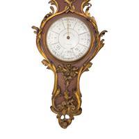 A Louis XV Style Gilt Bronze Mounted Kingwood Cartel Clock and Barometer