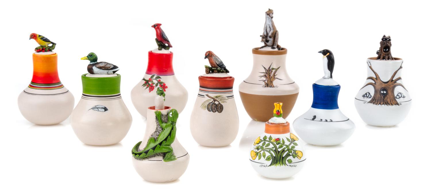 A Group of Nine Chemehuevi Covered Jars Height of tallest 2 1/8 inches. — Teresa Wildflower