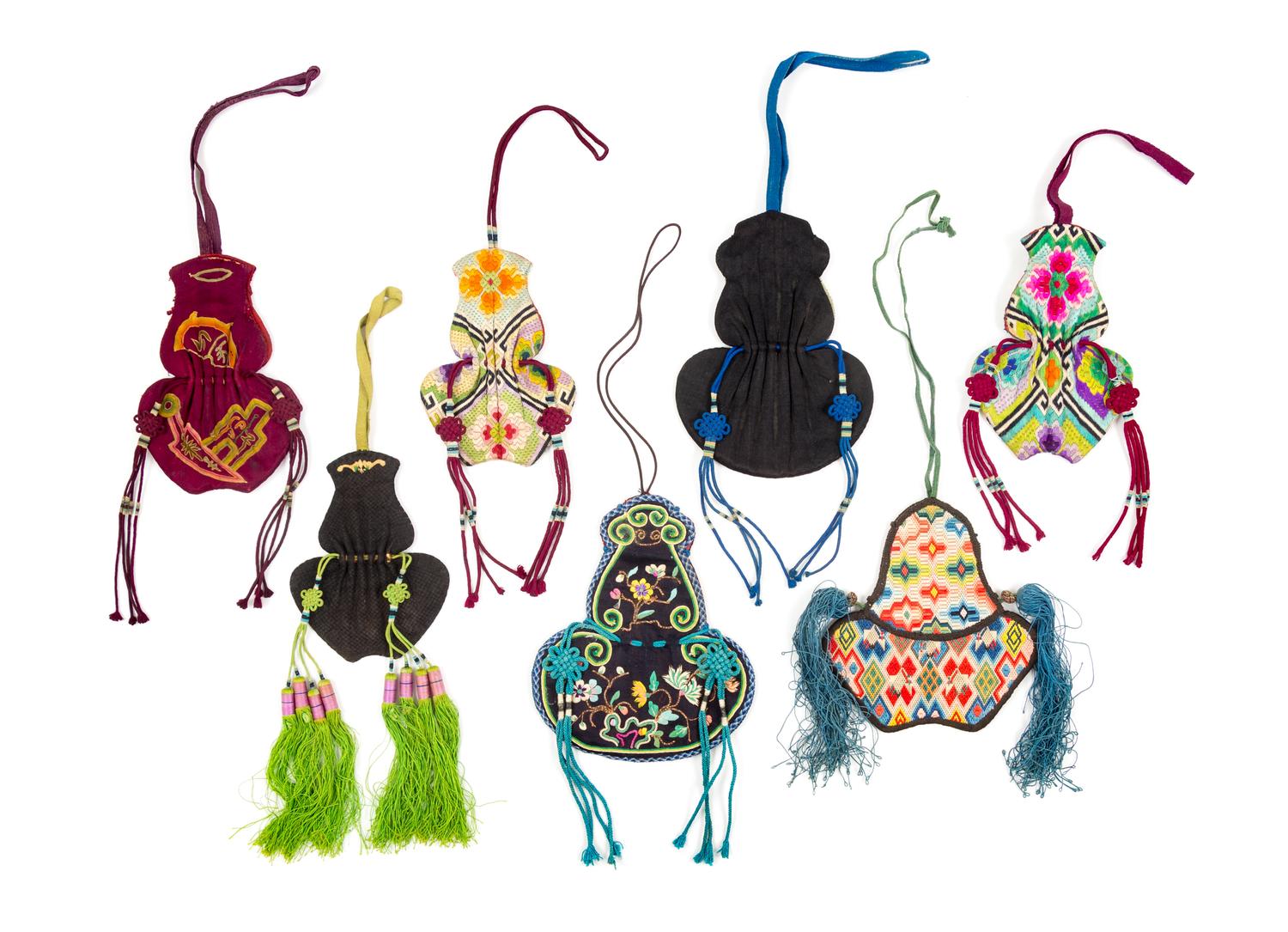 Seven Chinese Embroidered Silk Purses Length of largest 6 inches. — 19TH CENTURY