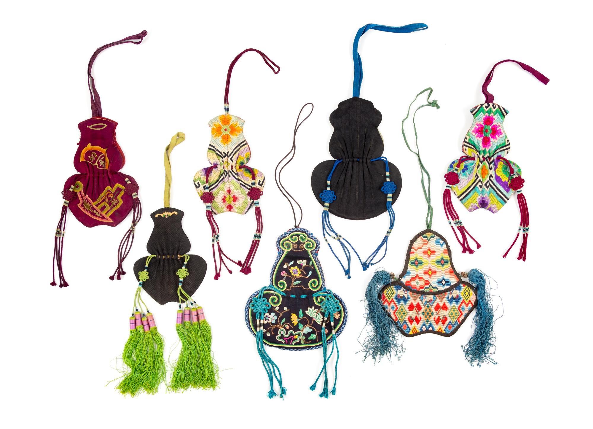 Seven Chinese Embroidered Silk Purses Length of largest 6 inches. — 19TH CENTURY