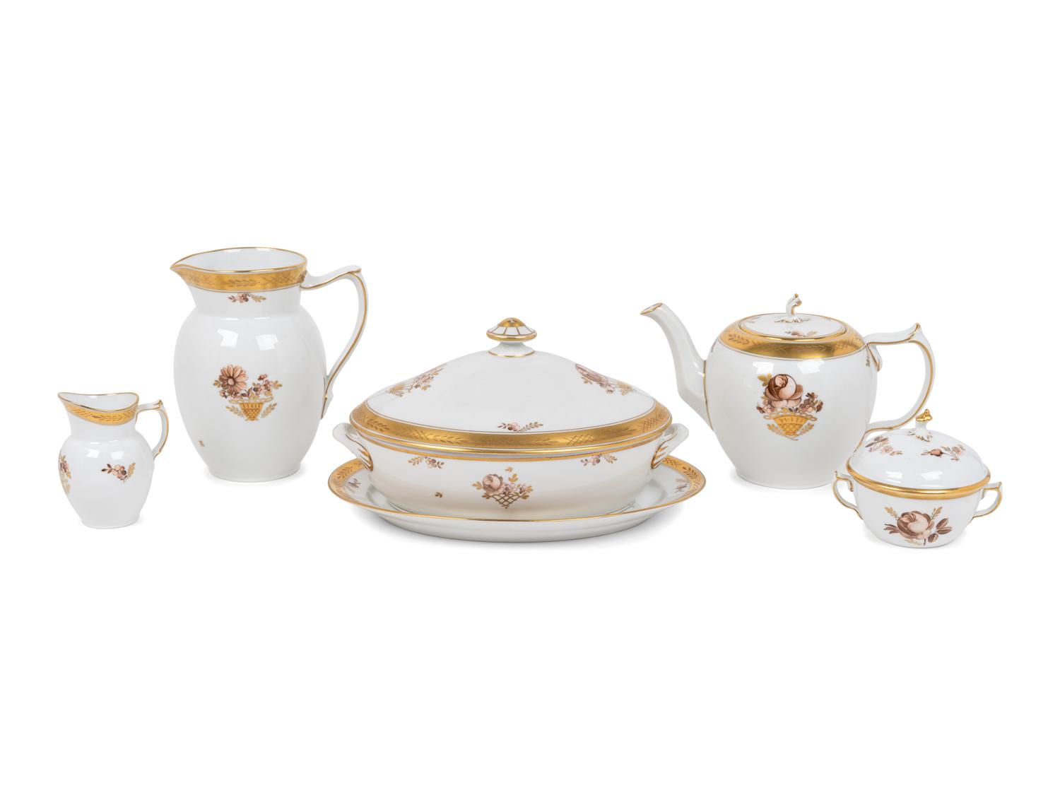 A Royal Copenhagen Gold Rose Porcelain Dinner Service