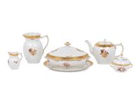 A Royal Copenhagen Gold Rose Porcelain Dinner Service