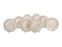 A Set of Seven American Silver Bread Plates