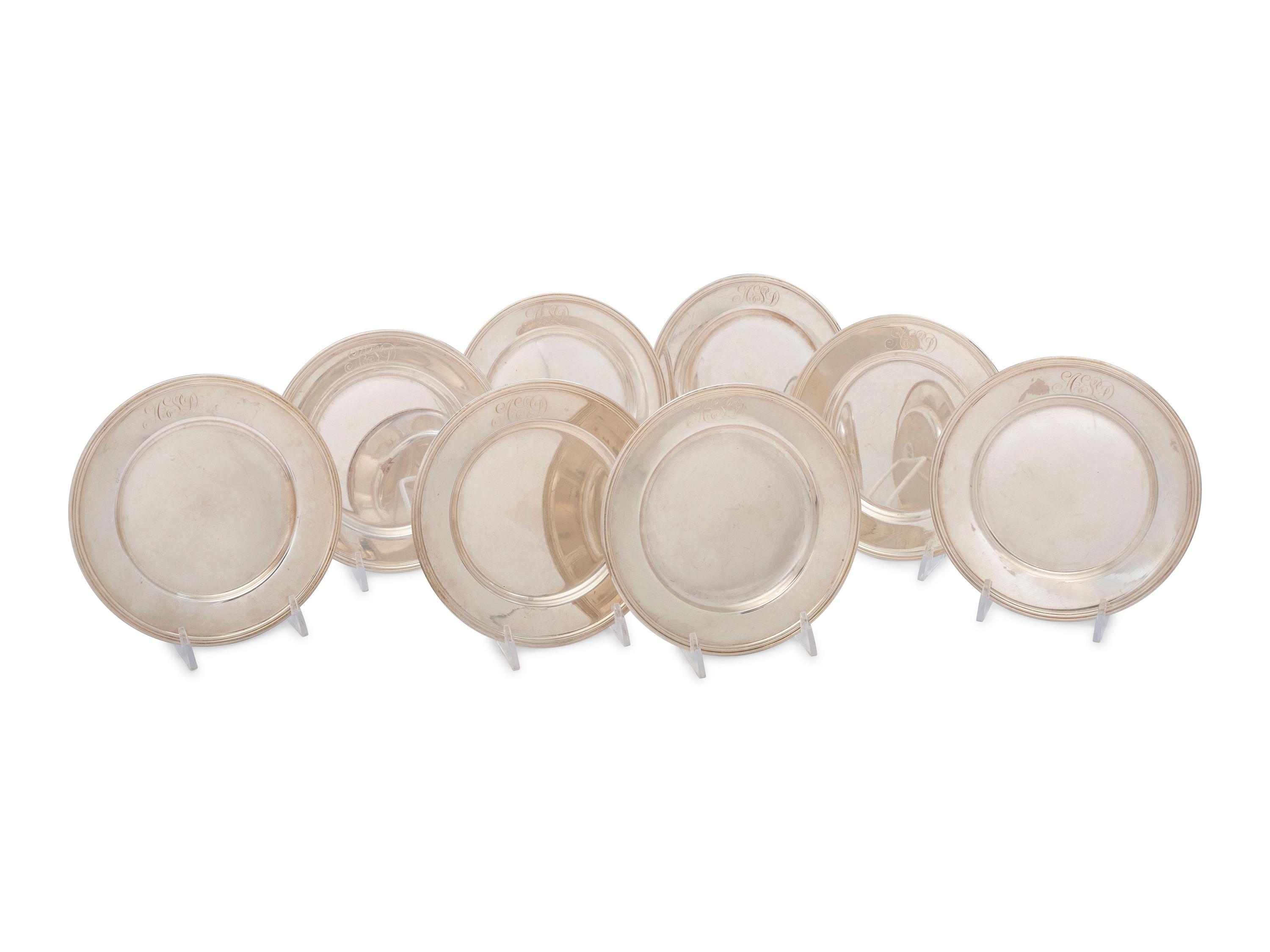 A Set of Seven American Silver Bread Plates