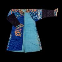A Chinese Blue Ground Embroidered Silk Dragon Robe, Jifu, Late 19th Century 清晚期 藍緞地綉云龍紋吉服