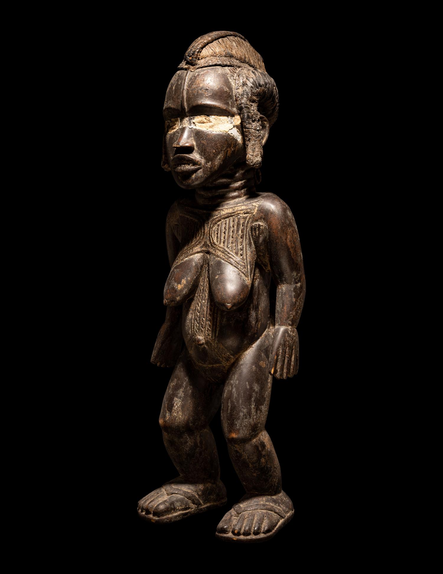 A Dan Wood Standing Female Figure