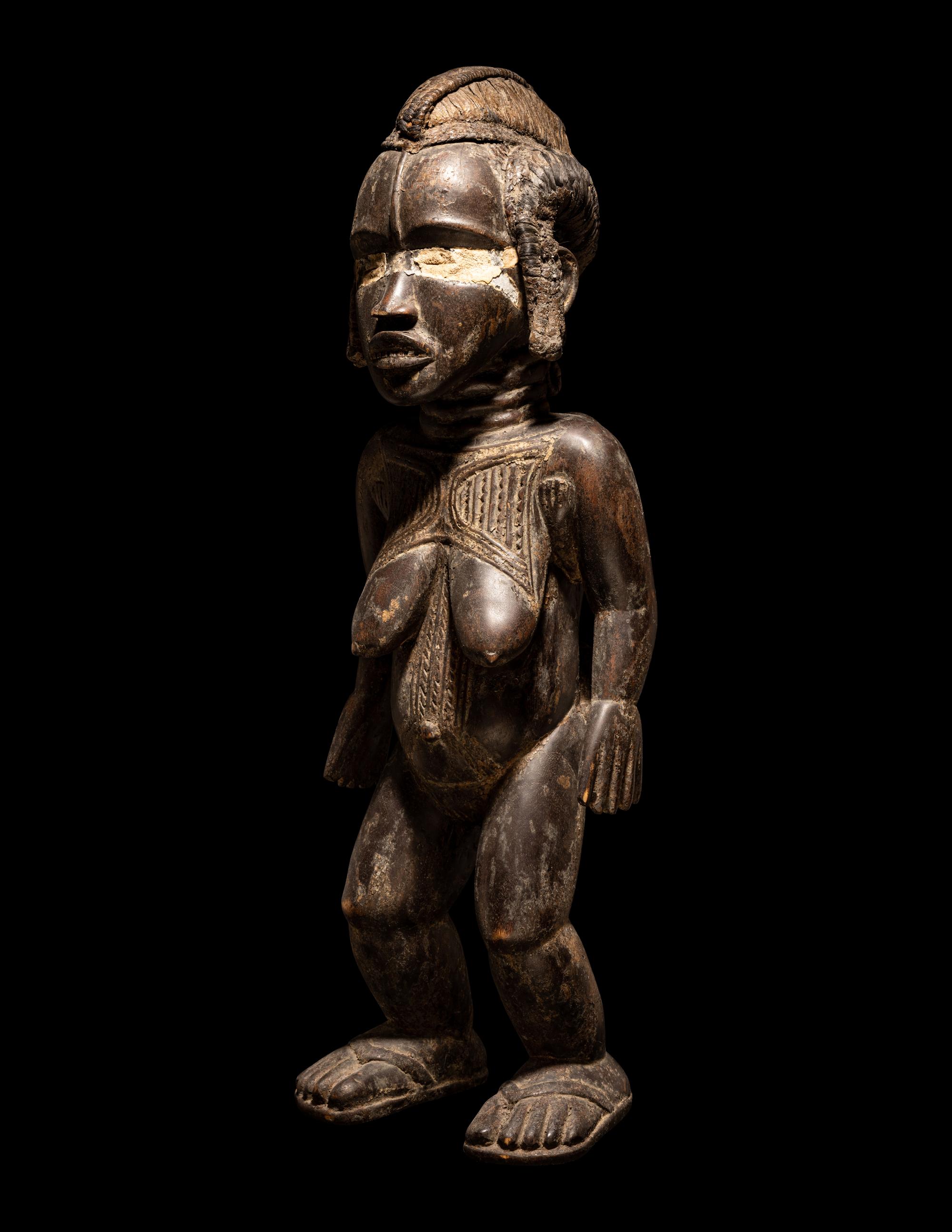 A Dan Wood Standing Female Figure