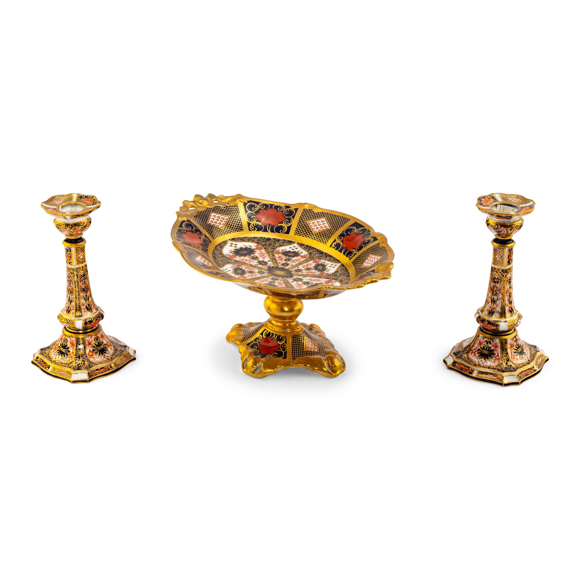 A Pair of Royal Crown Derby Imari Porcelain Candlesticks and a Tazza