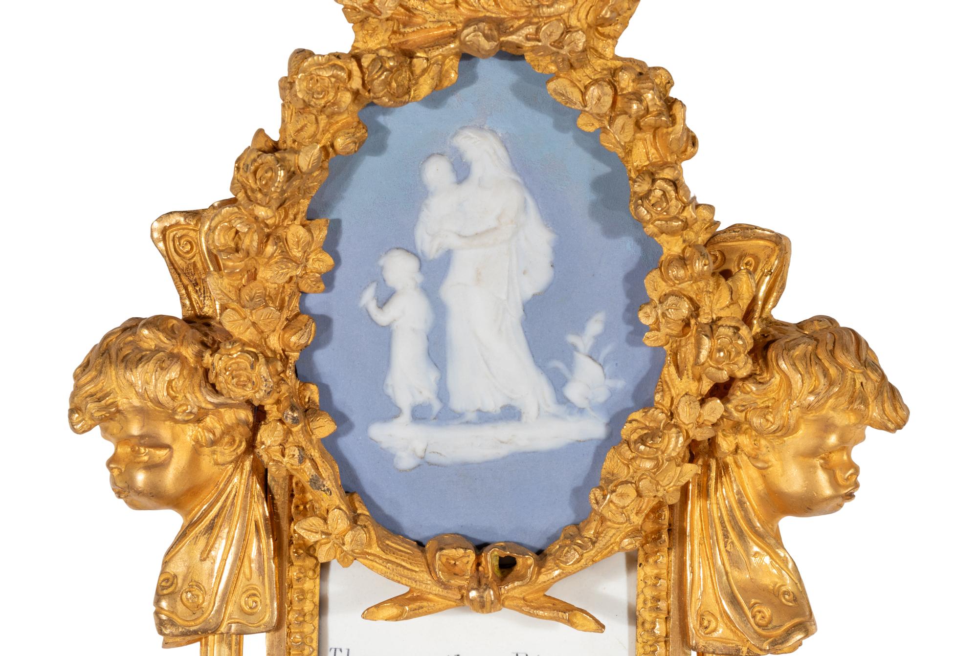 A French Neoclassical Gilt Bronze and Jasperware Cartel Clock and Barometer Set