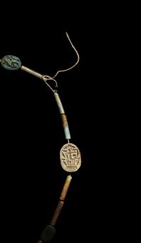 An Egyptian Faience Bead and Amulet Necklace
