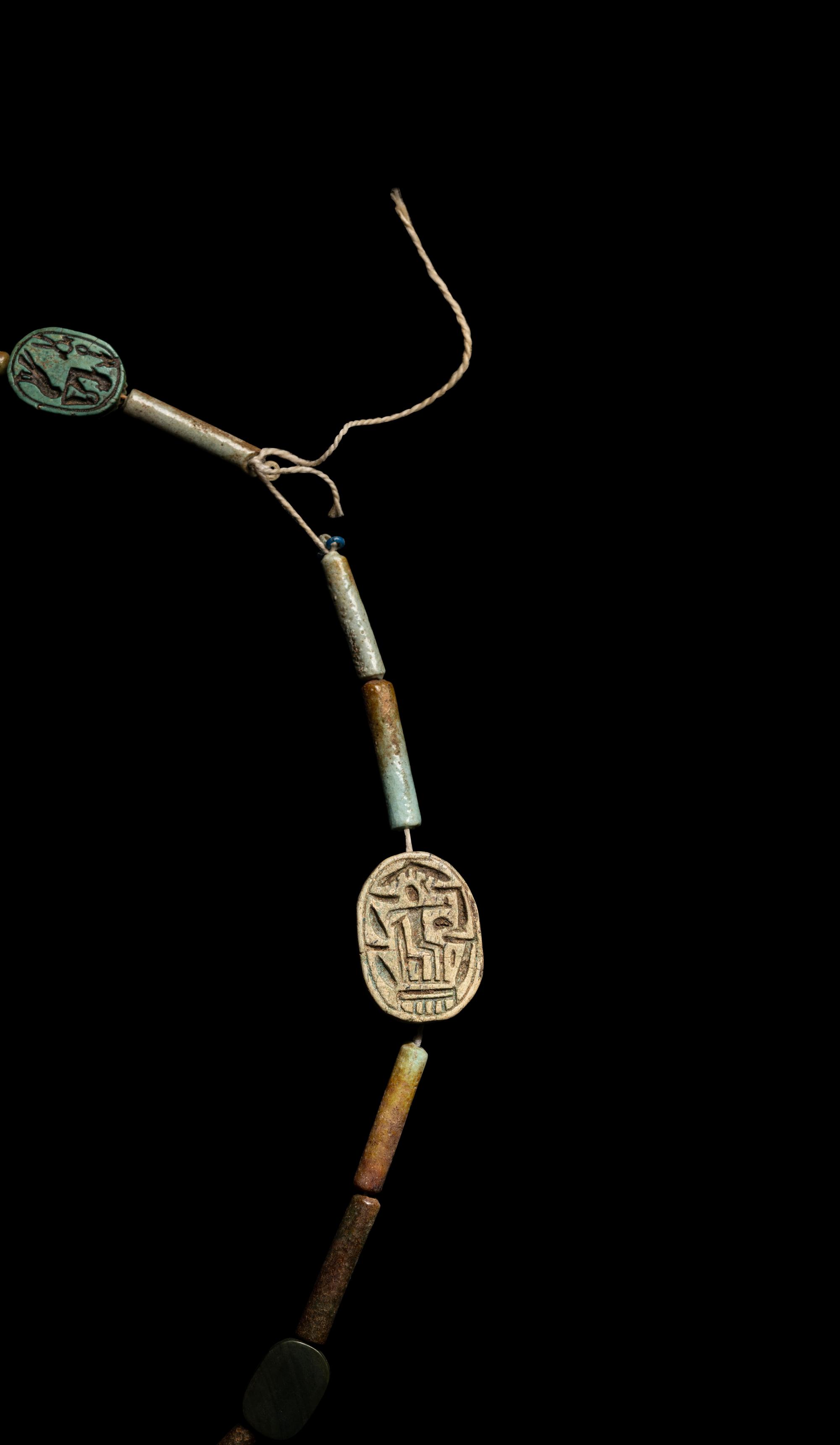An Egyptian Faience Bead and Amulet Necklace