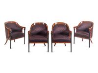 A Set of Four Biedermeier Mahogany Veneered and Parcel Ebonized Armchairs