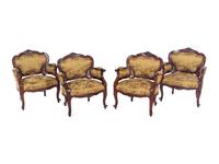 A Set of Four Rococo Style Upholstered Mahogany Armchairs